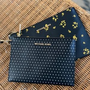 Black Michael Kors wristlet clutches
